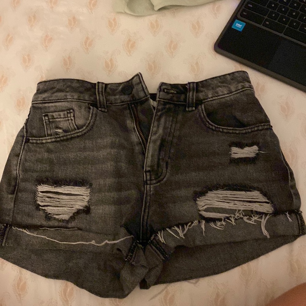 Black ripped denim shorts
